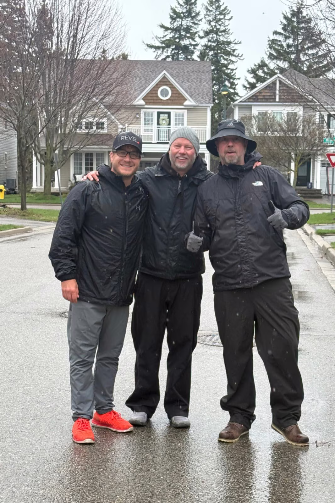 Dan Gregoire, Doug Gordon and Rich Gordon delivering donation bags for the Revel Realty Feed the Need Durham food drive