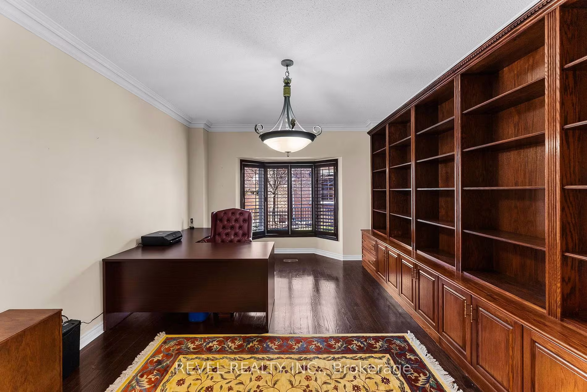 Main-floor office with hardwood flooring at 1486 Ashwood Gate, Pickering, listed by The Gordon Brothers Team, Revel Realty Inc., Brokerage