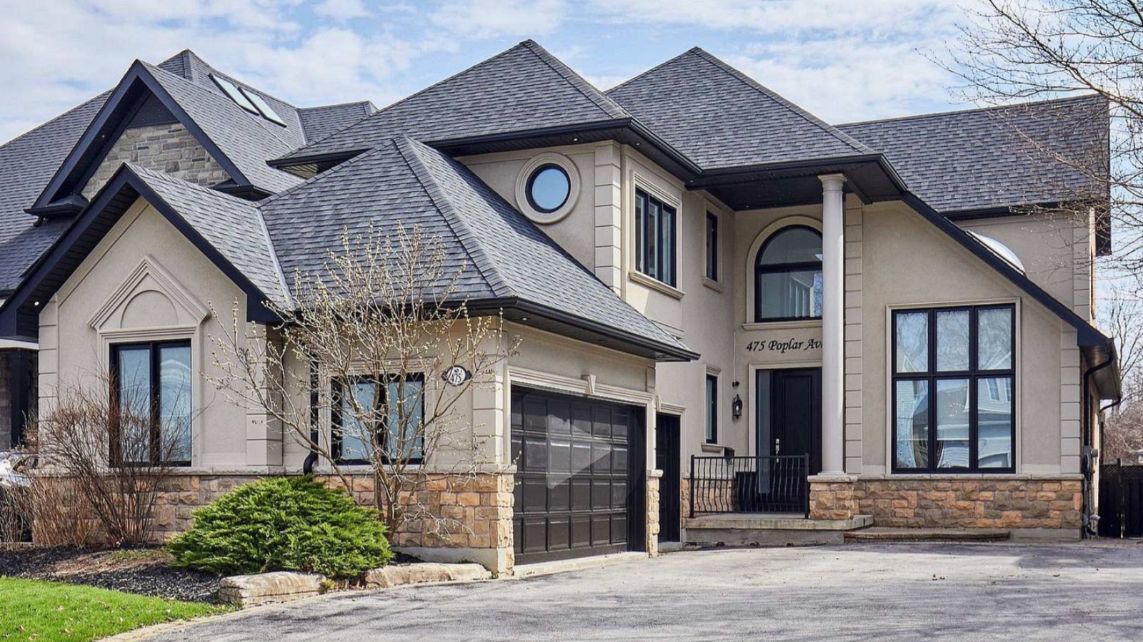 475 Poplar Ave, Ajax, a custom detached home with stone exterior and double garage, for sale with The Gordon Brothers Team