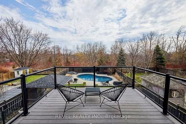 Elevated deck overlooking the inground saltwater pool at 475 Poplar Avenue, Ajax